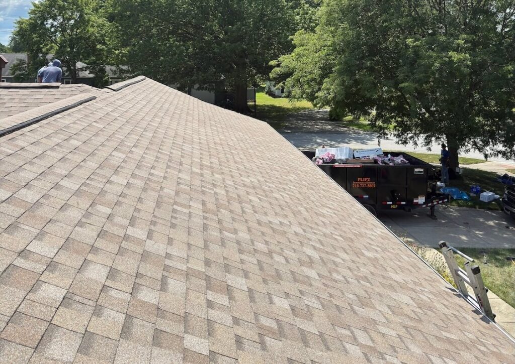 Roof replacement project completed in Berea Ohio by Python Roofing. Owens Corning asphalt shingles.